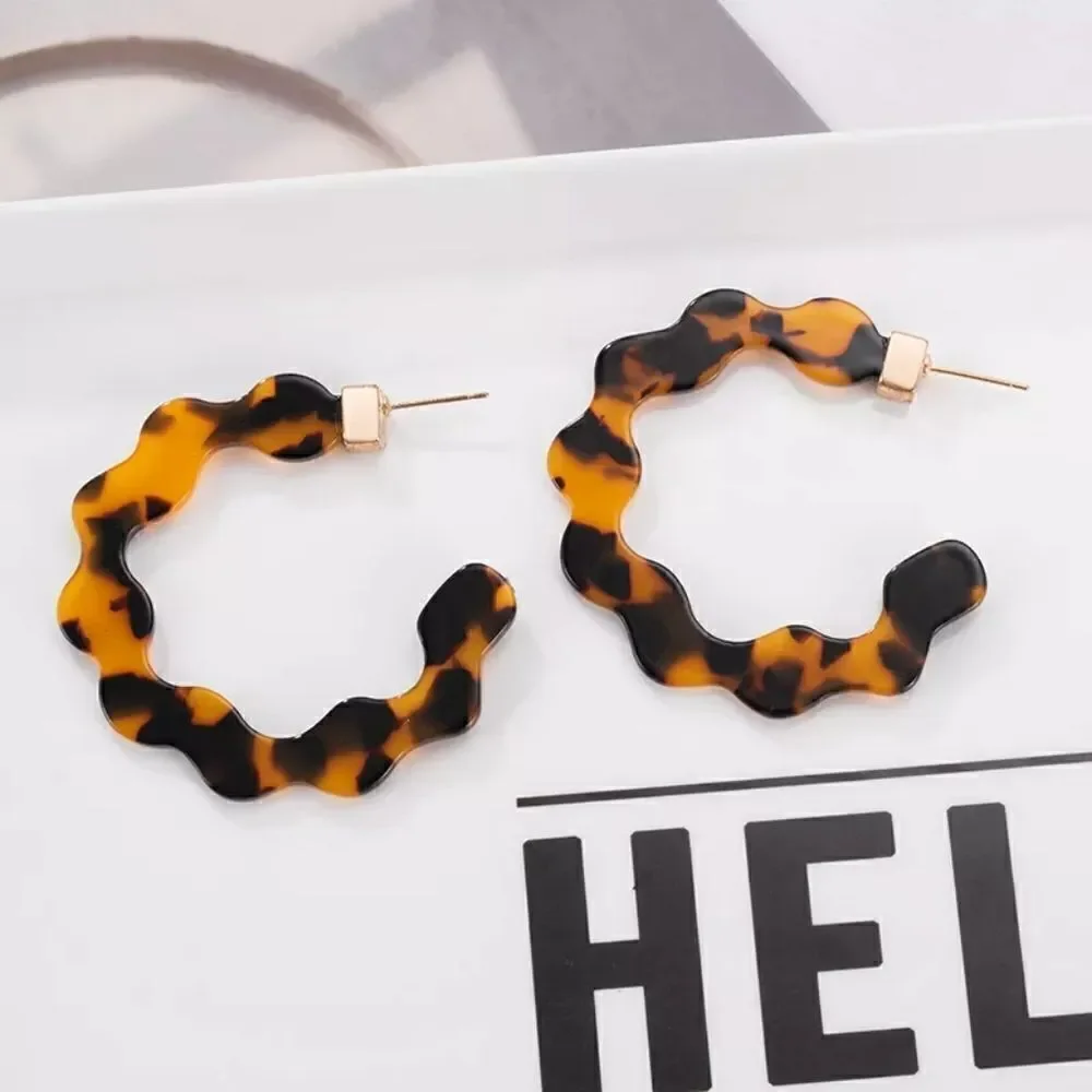 Wavy Resin Hoop Earrings in Dark Brown Tortoiseshell from BaubleBar